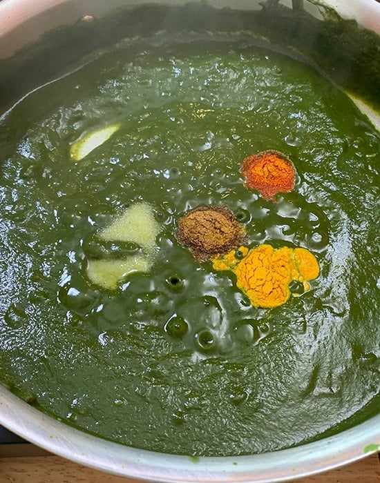 spinach puree with spices like turmeric, chili powder
