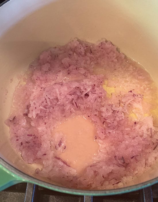 pureed onions cooking in a pot