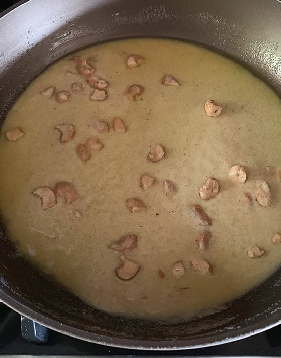 roasted sooji with ghee in a pan