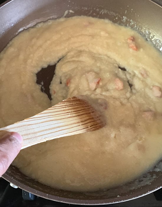stirring halwa with a spatula