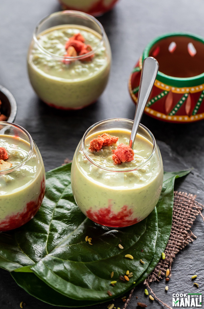 spoon placed inside a glass of paan kheer