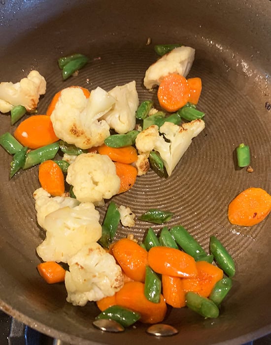 pan fried vegetables in a pan
