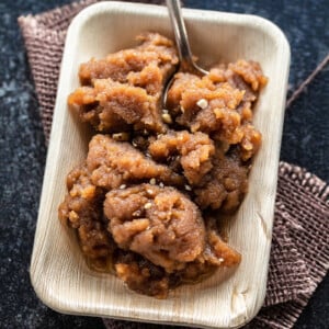 atta halwa served in a rectangular plate made with bamboo