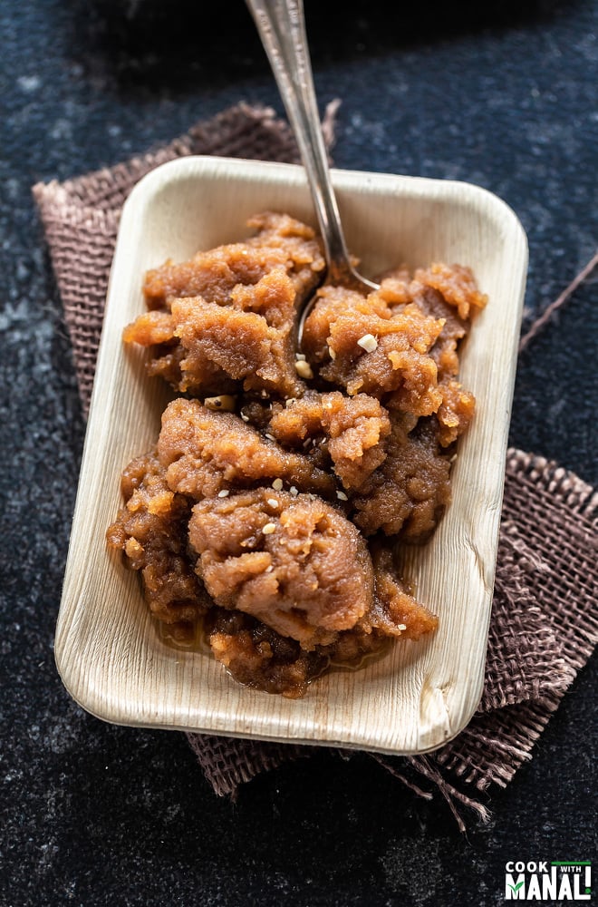 atta halwa served in a rectangular plate made with bamboo