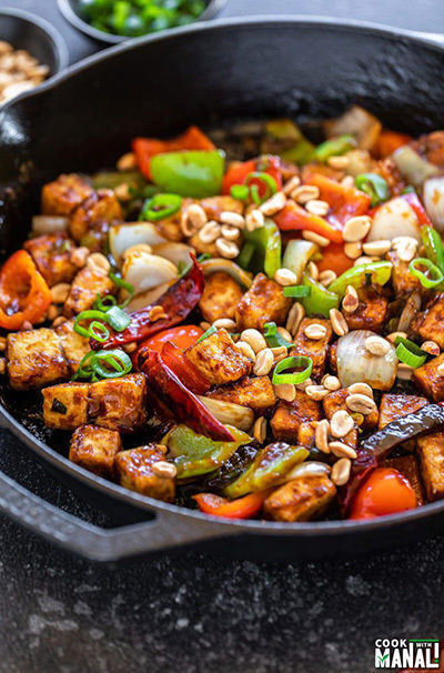 kung pao tofu in a cast iron skillet