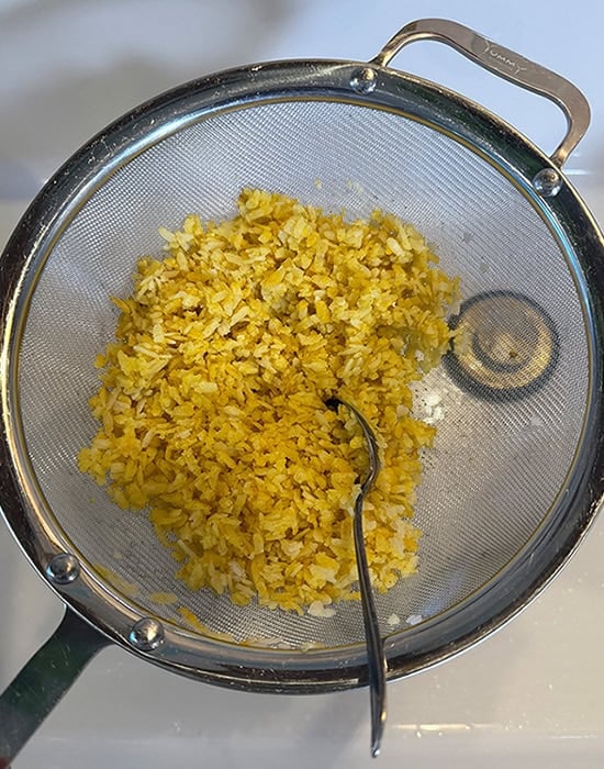 poha in a strainer
