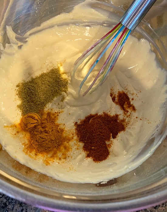 yogurt besan with spices in a bowl
