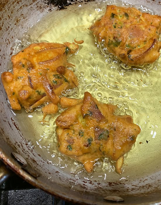 deep fried pakoras in hot oil