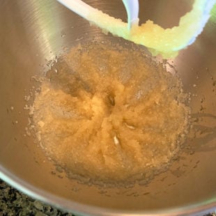 oil and sugar creamed in a stand mixer