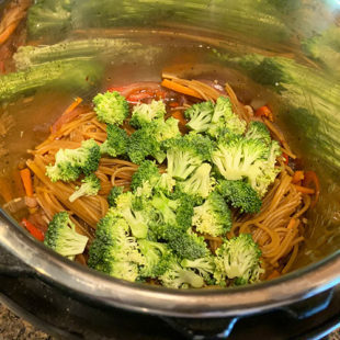 broccoli on top of spaghetti noodles in instant pot