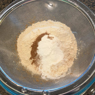 strainer with flour, cinnamon, baking powder