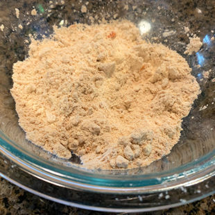 spices and flour mixed together in a bowl