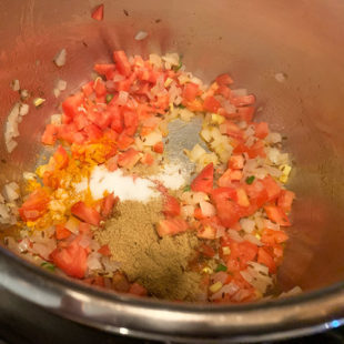 tomato and spices in a pot