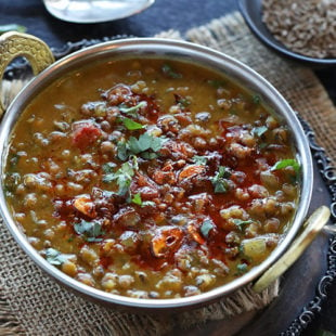 lentils topped with spices and cilantro