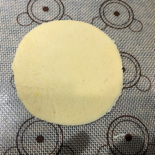 rolled dough in shape of a circle