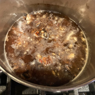 tamarind boiling in water in a pan