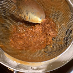 left out fiber after sieving a mixture with a strainer
