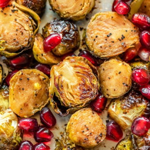 overhead shot of roasted brussel sprouts with pomegranate