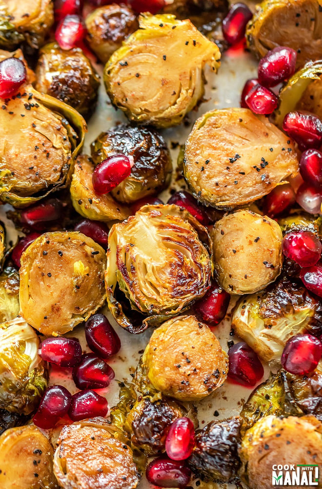 overhead shot of roasted brussel sprouts with pomegranate