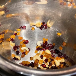cashews and raisins in a pot