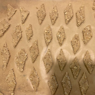 diamond shaped cut dough placed on baking tray