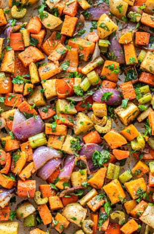 assorted roasted veggies on a baking tray