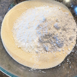 bowl with semolina and powdered sugar