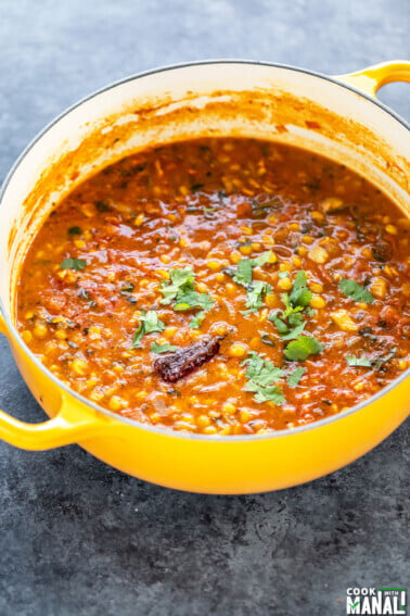 chana dal in a yellow color pot