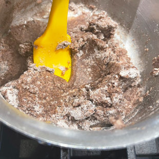 ragi flour added to a pan