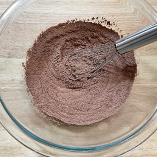 bowl with sifted flour, cocoa powder