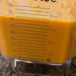 blended tomato soup in a blender