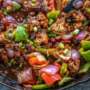 cauliflower with onions, peppers, peanuts