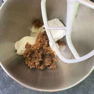 cream cheese, gulkand and sugar in a bowl