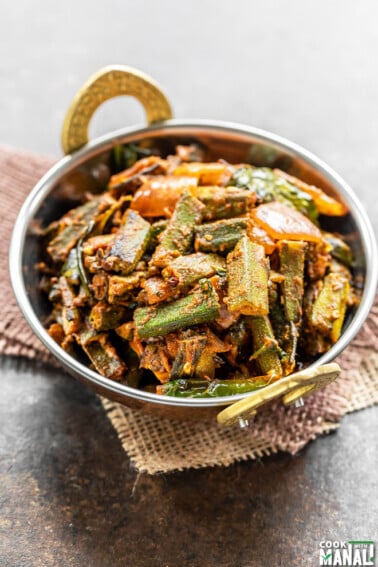 bhindi served in a copper kadai