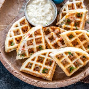 savory waffles served with coconut chutney and glass of chai