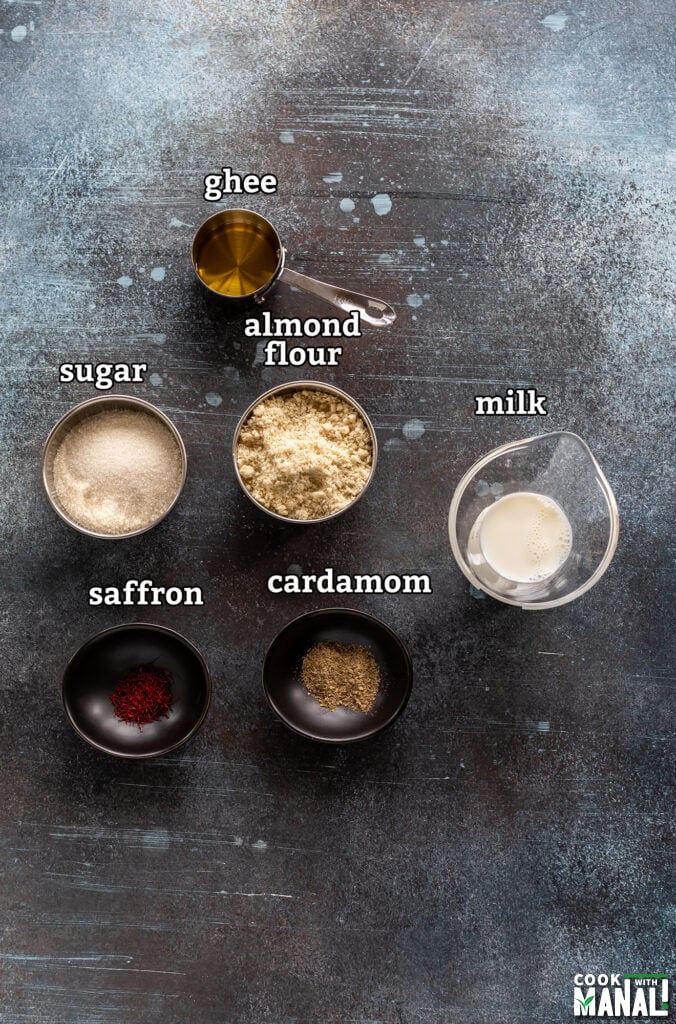 ingredients for badam halwa arranged on a board