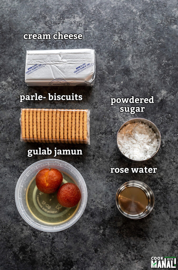 ingredients for gulab jamun cheesecake truffles arranged on a board