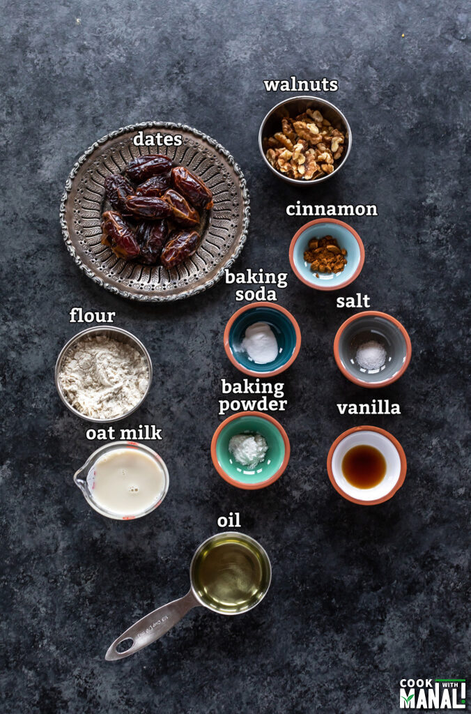ingredients for date walnut cake arranged on a board