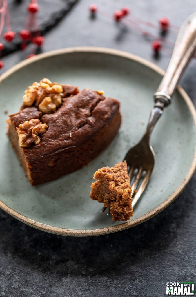 a small piece from the cake on a fork to show the texture of the cake