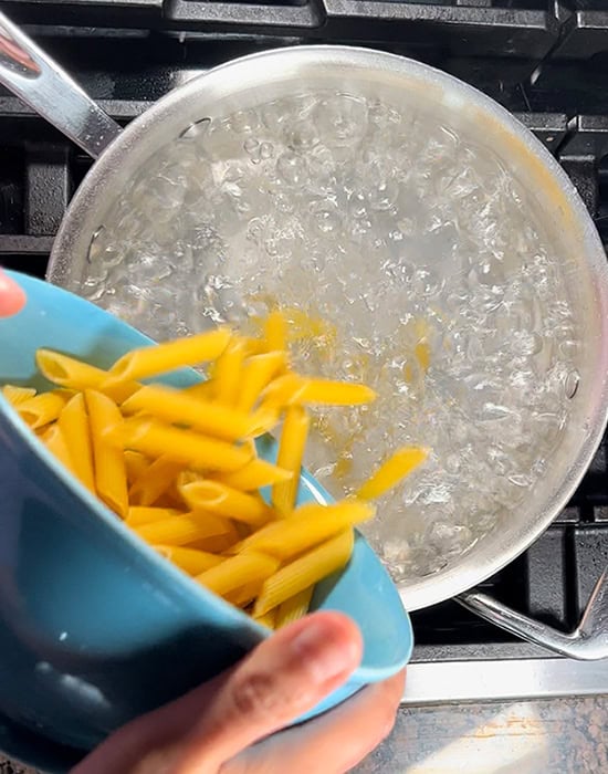 pasta being boiled in water