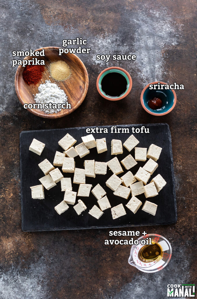 ingredients to make crispy air fryer tofu arranged on a board