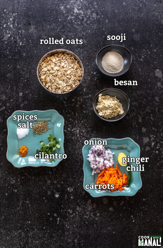 ingredients for making oats chilla arranged on a board