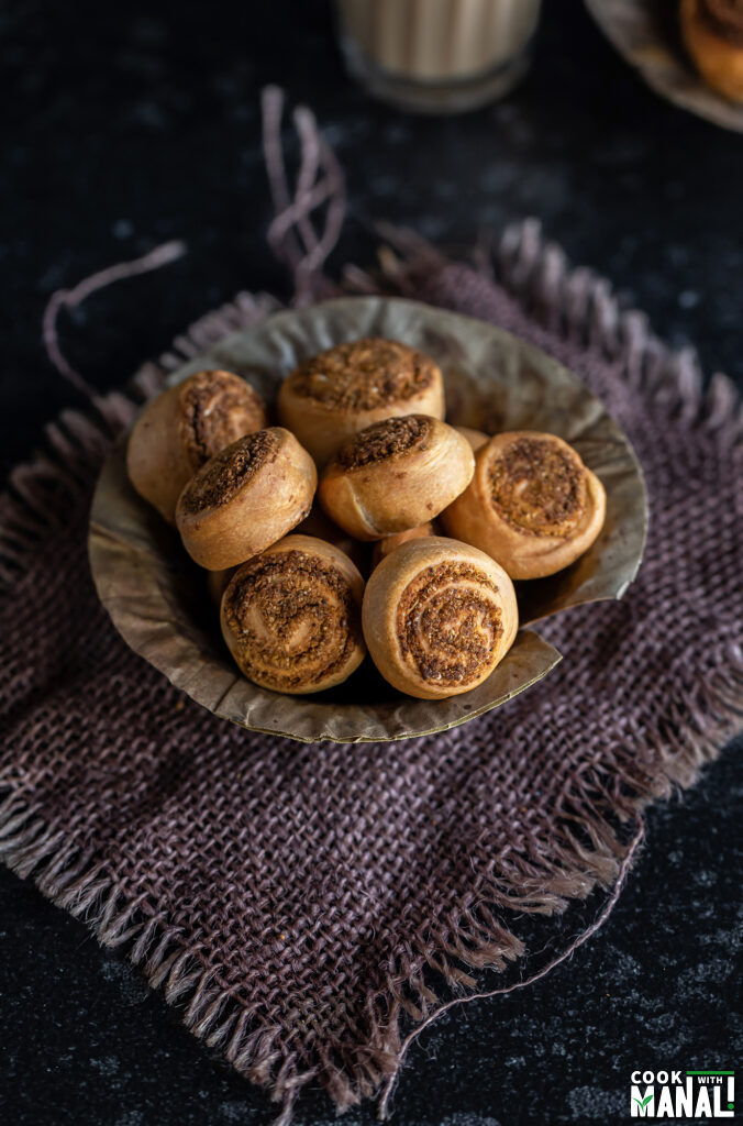 air fried bhakarwadi served in a paper bowl