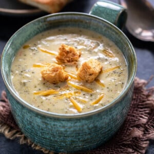 broccoli cheddar soup topped with croutons served in a big bowl