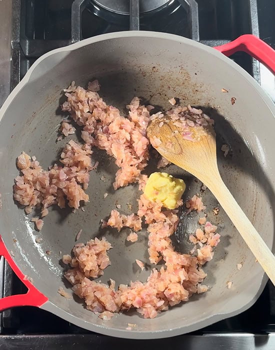 caramelized onions with ginger garlic paste in a pan