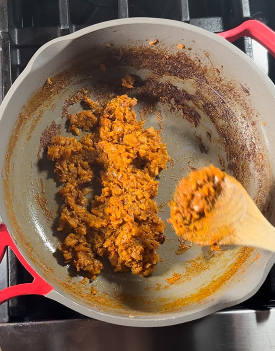 cooked onion tomato masala in a pan