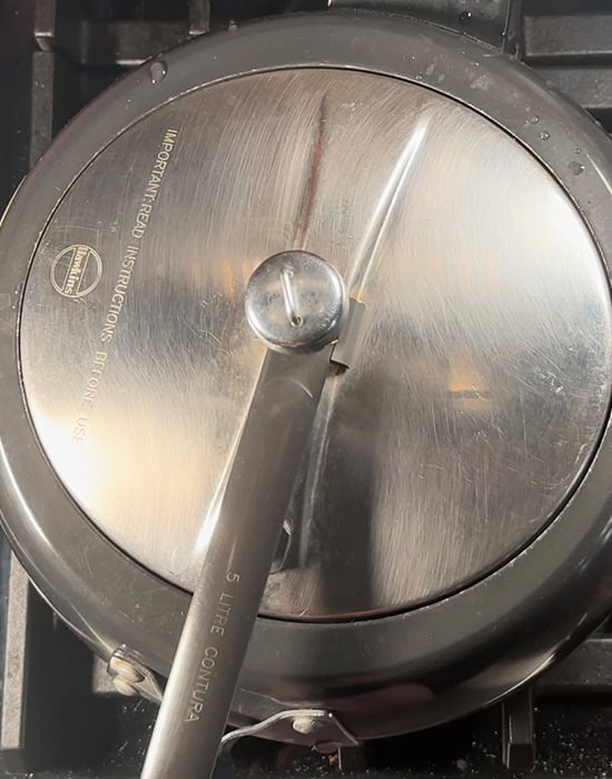 a stovetop pressure cooker closed with lid