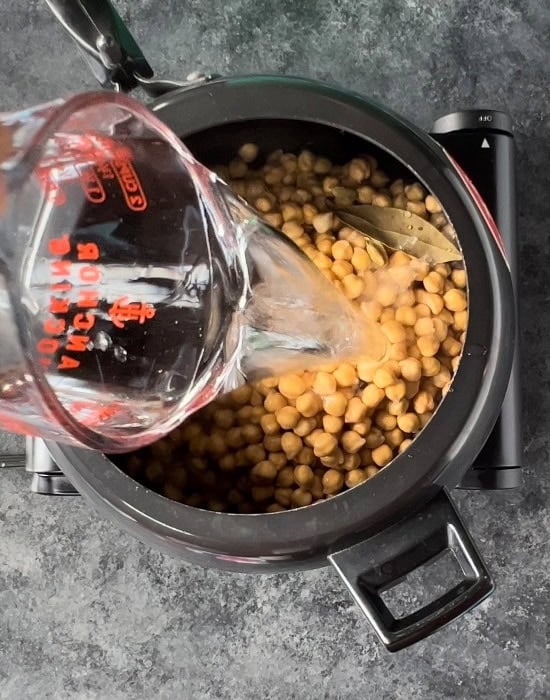 adding water to a pressure cooker