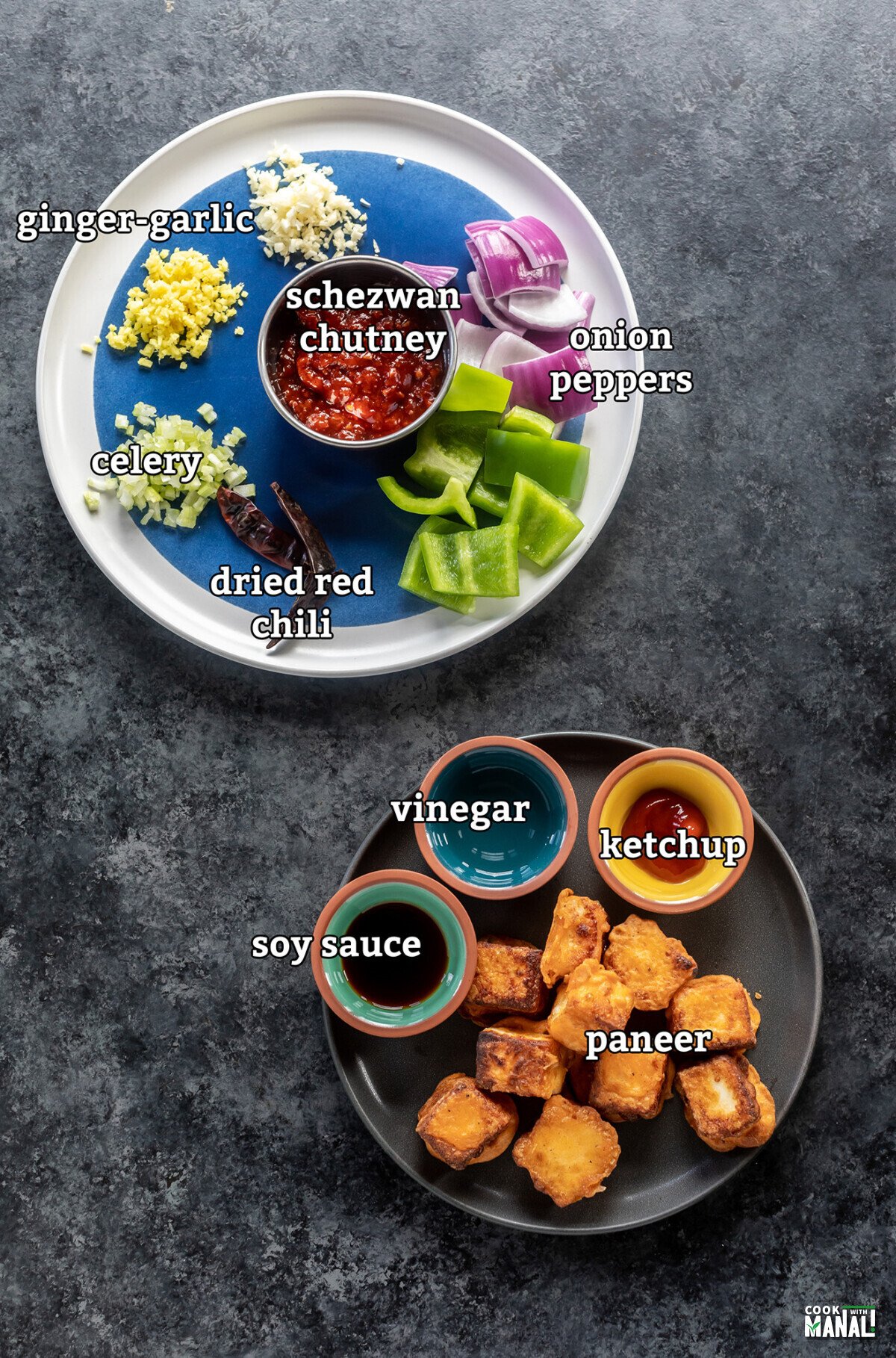 ingredients for making schezwan paneer arranged on a board