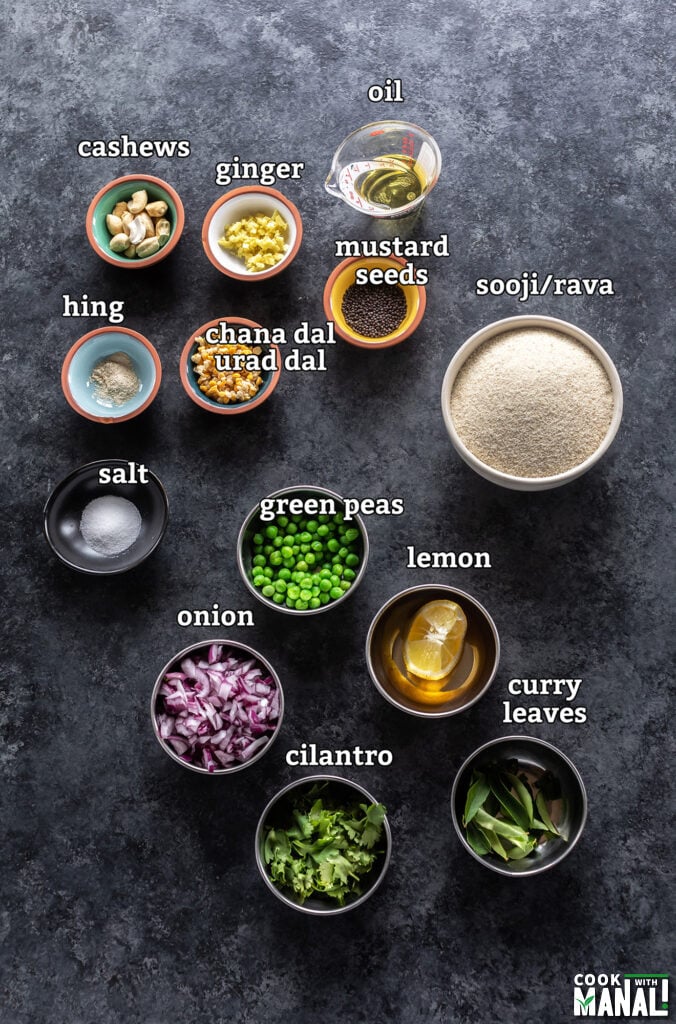 ingredients required for making upma arranged on a black board